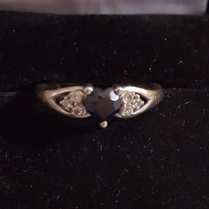 10k Gold and sapphire ring with cz accents.